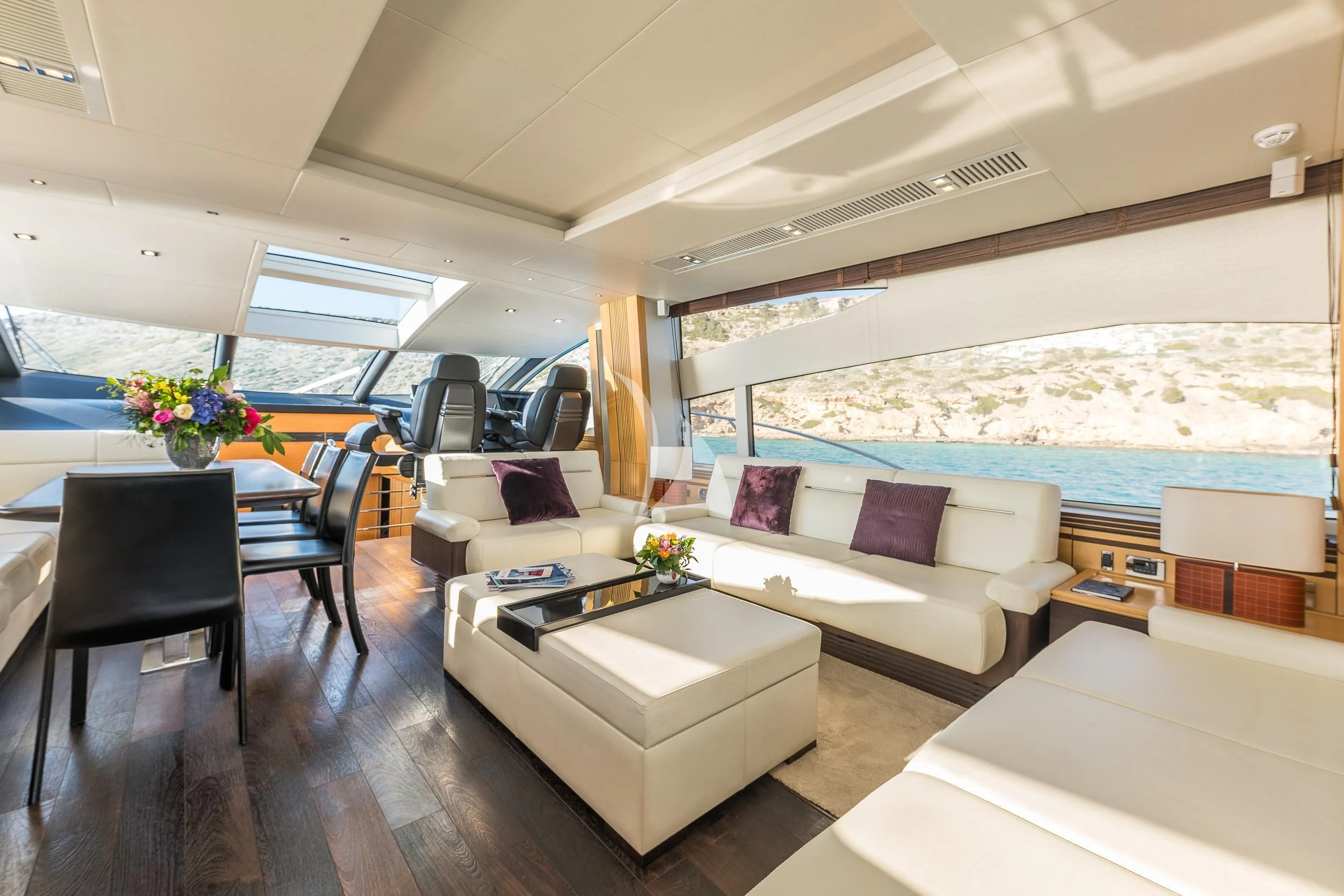 a living room with a large window aboard SEAWATER Yacht for Sale