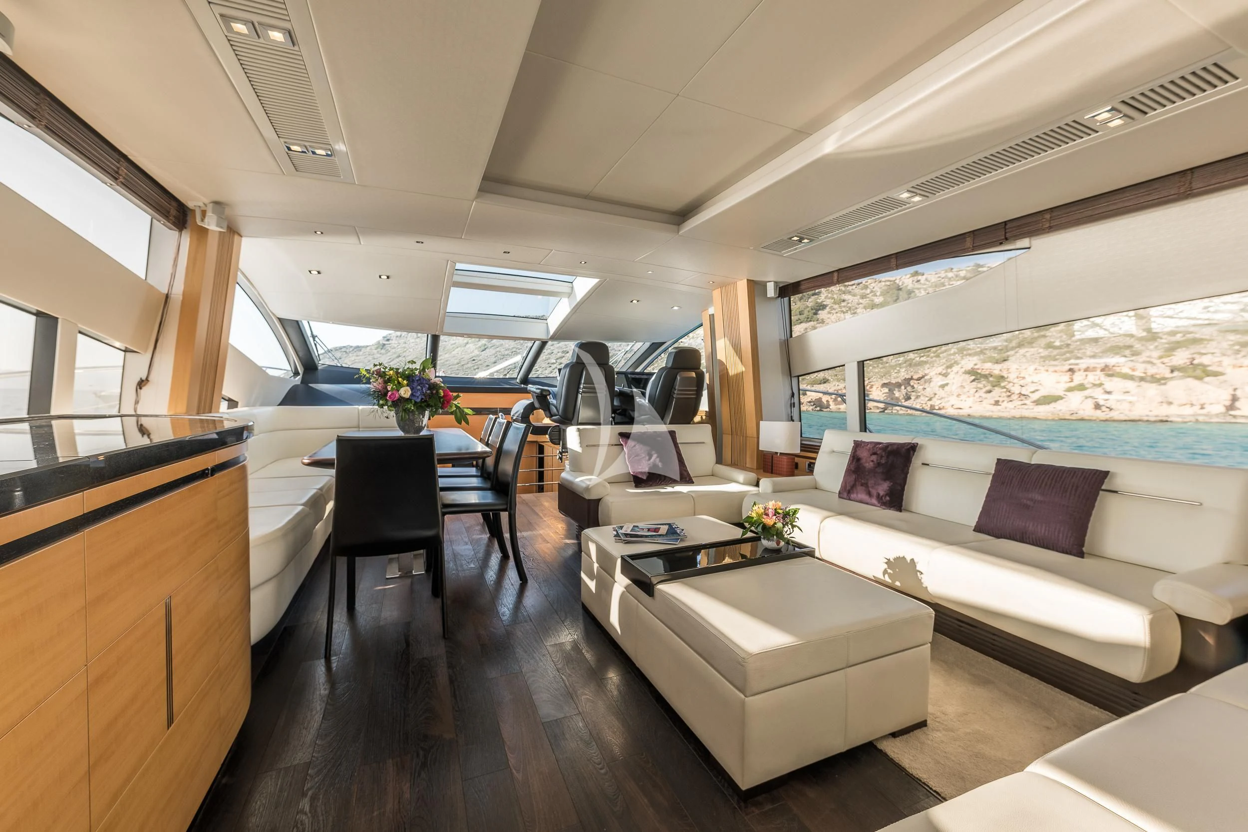 a living room with a large window aboard SEAWATER Yacht for Sale