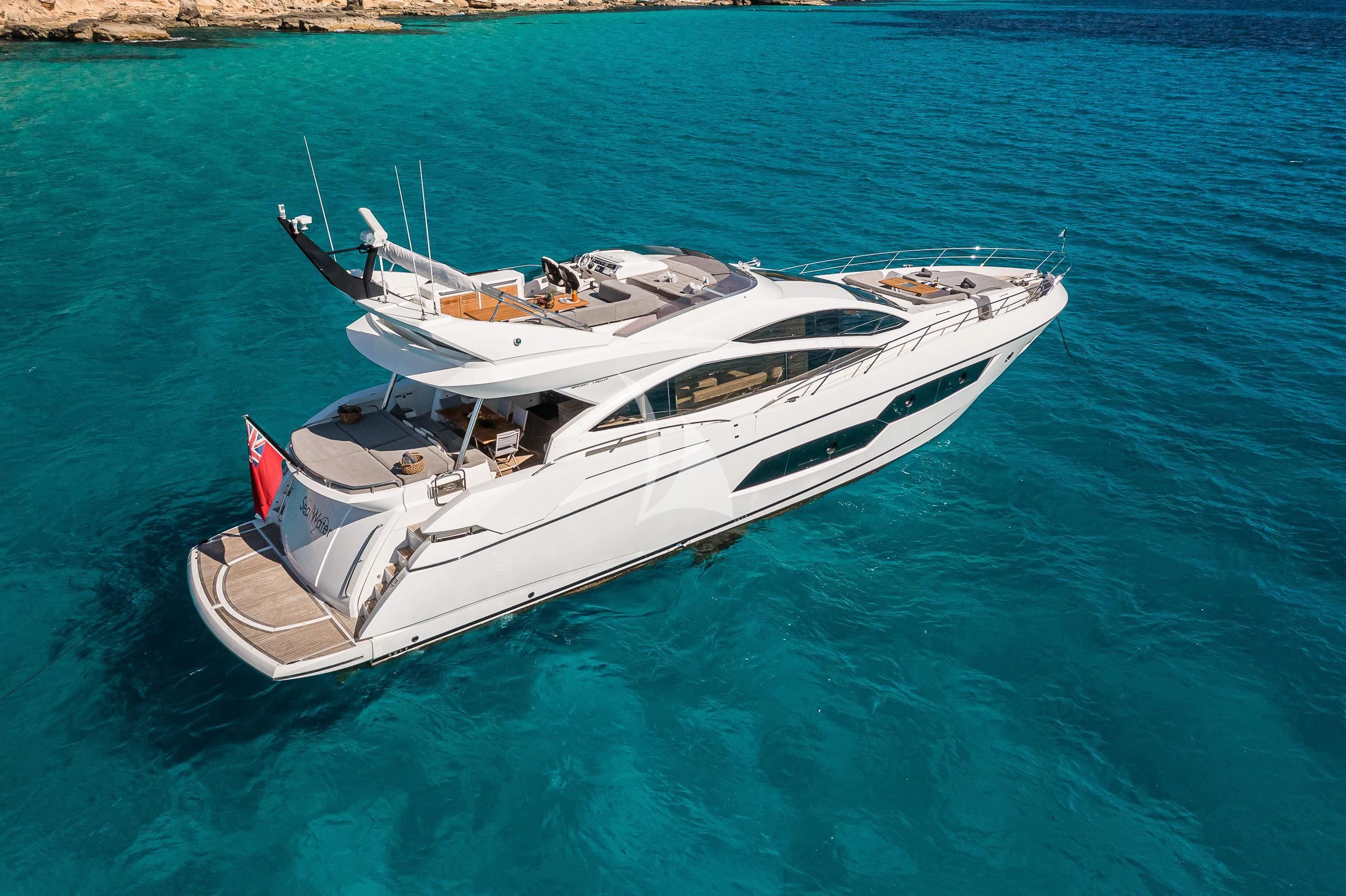 a white yacht in the water aboard SEAWATER Yacht for Sale