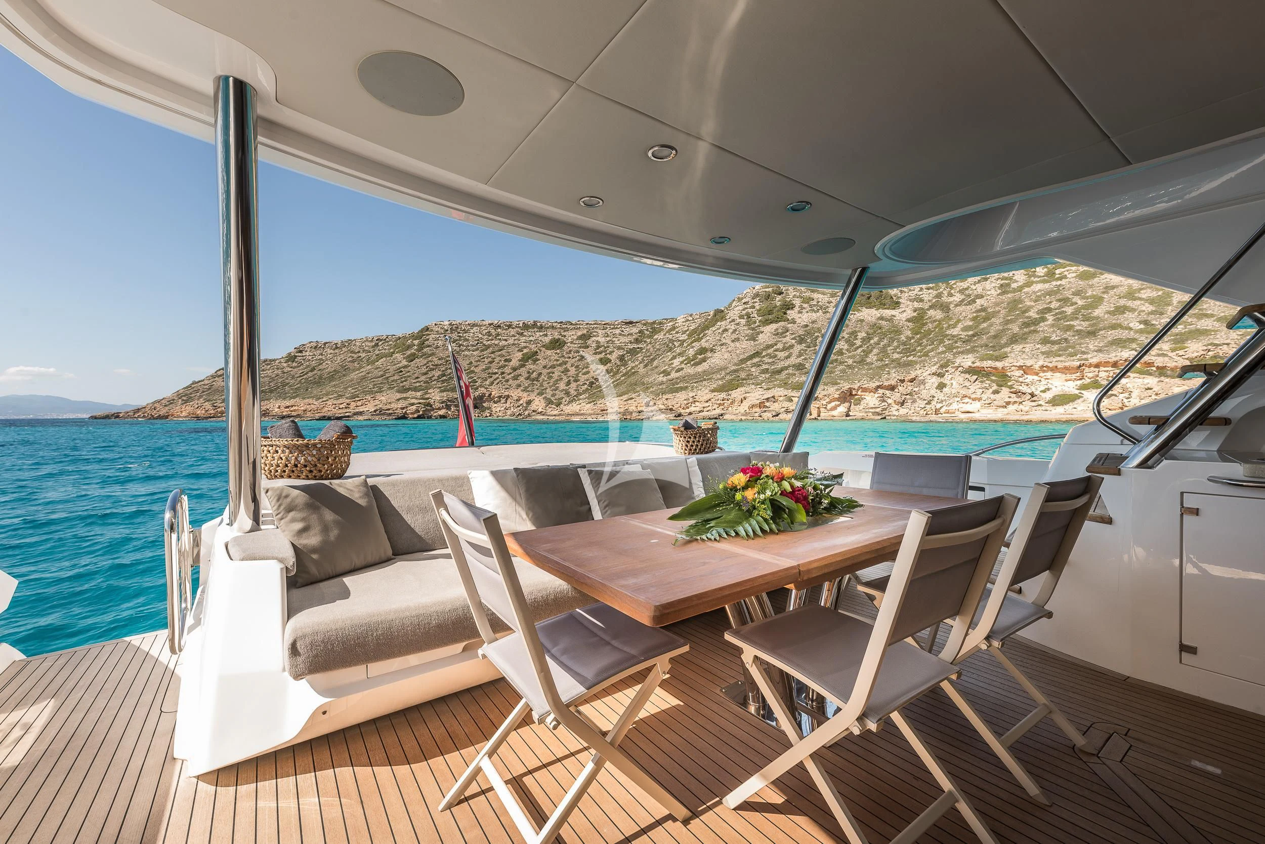 a table and chairs on a boat aboard SEAWATER Yacht for Sale