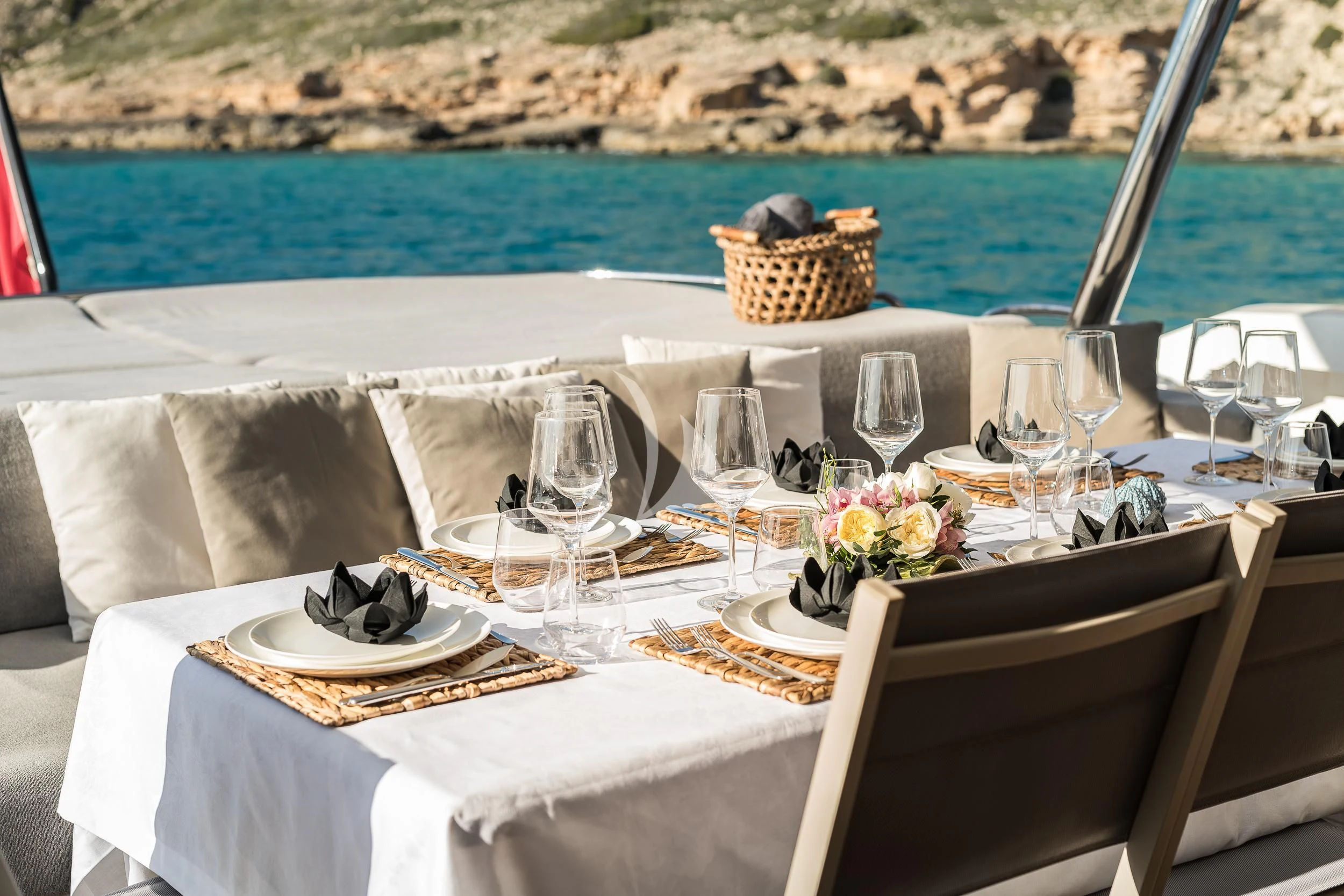a table set for a dinner aboard SEAWATER Yacht for Sale