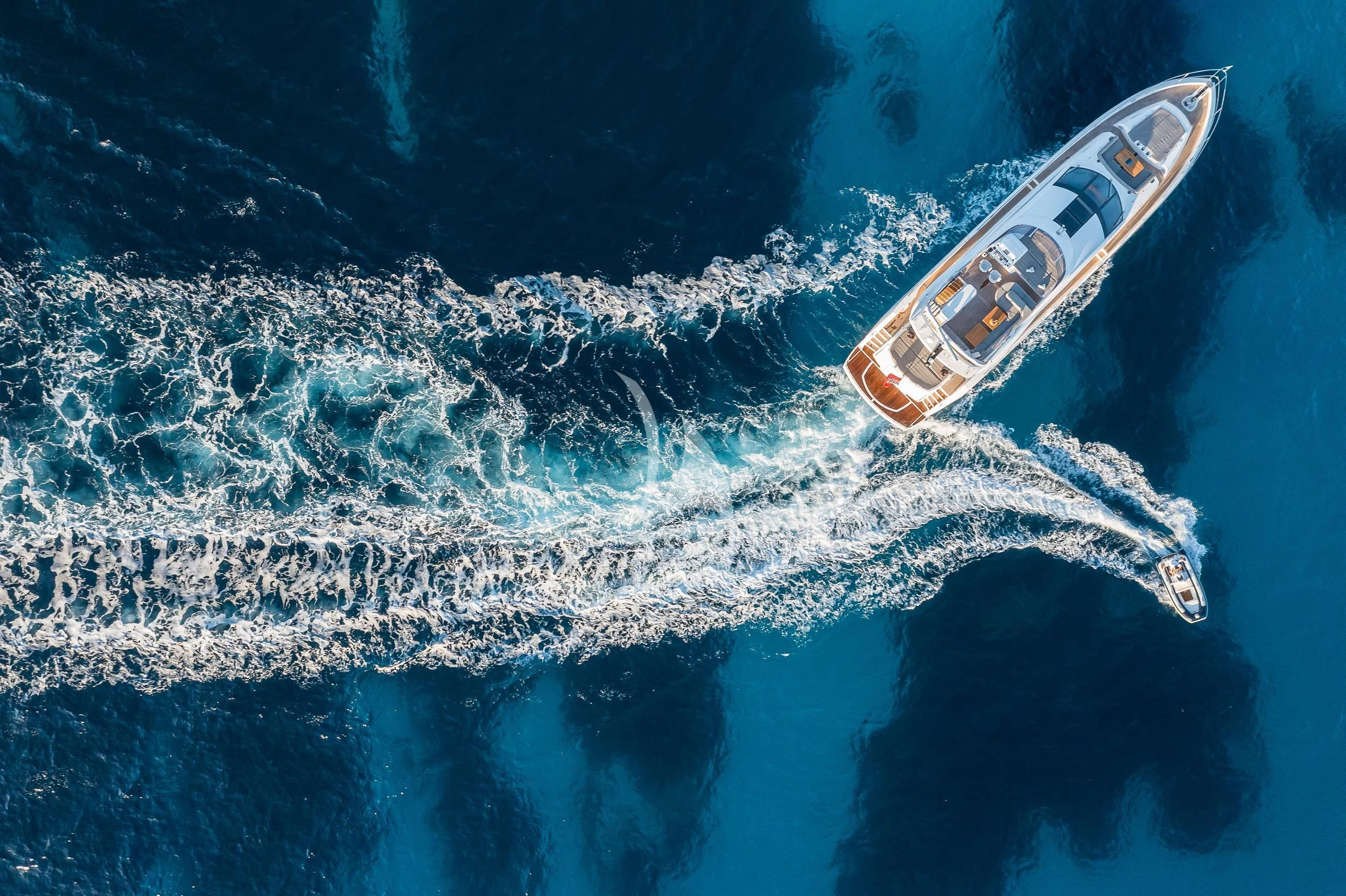 a white and red boat in the water aboard SEAWATER Yacht for Sale