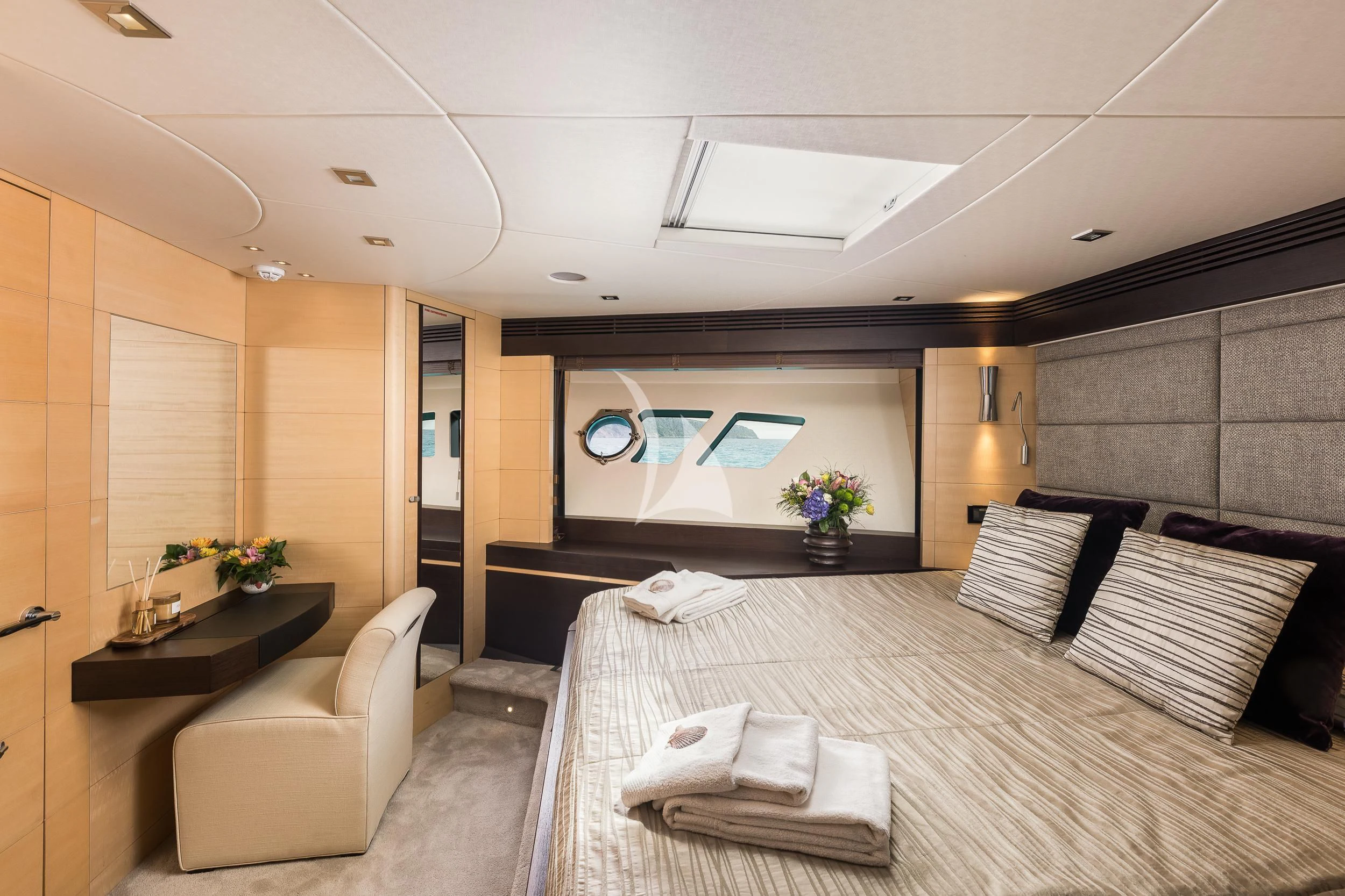 a hotel room with a bed and a desk aboard SEAWATER Yacht for Sale