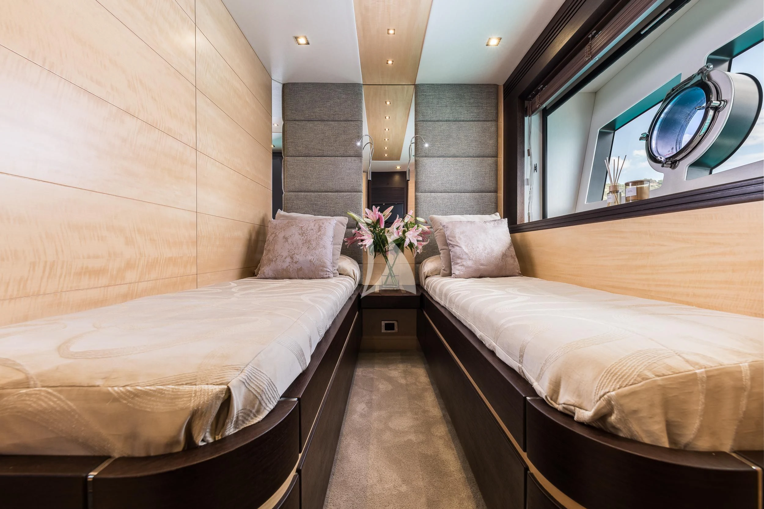 a room with two beds aboard SEAWATER Yacht for Sale