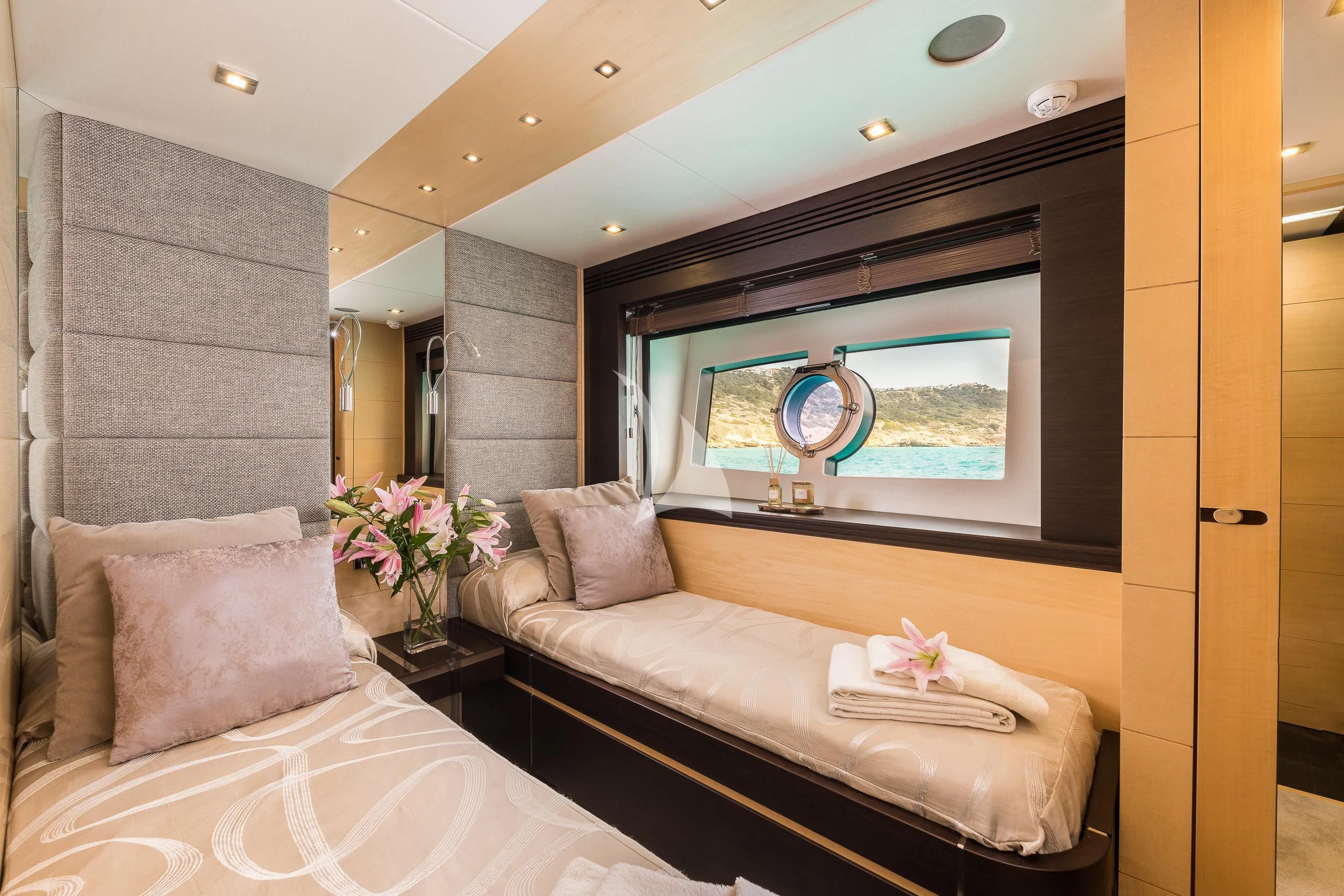 a room with a bed and a fish tank aboard SEAWATER Yacht for Sale