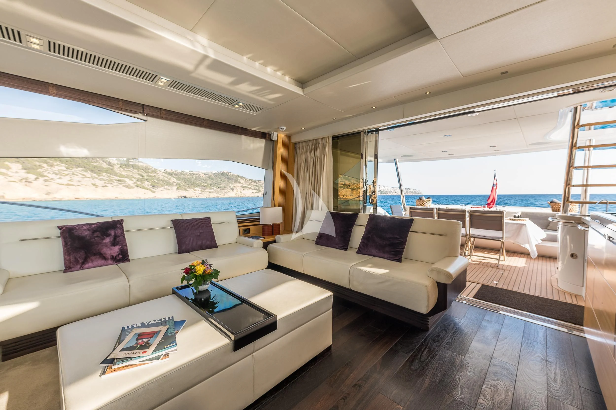 a living room with a large window aboard SEAWATER Yacht for Sale