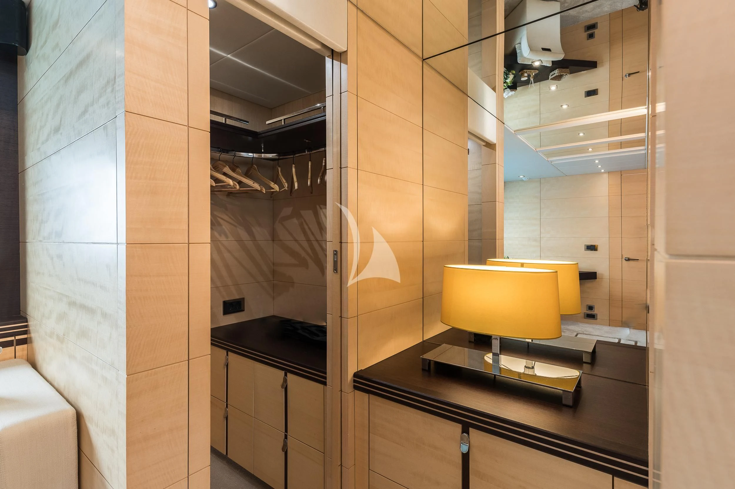 a bathroom with a large mirror aboard SEAWATER Yacht for Sale