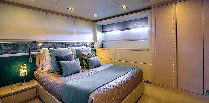a bed in a room aboard QUEEN ALLA Yacht for Sale