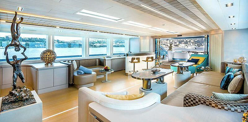 a living room with a large window aboard QUEEN ALLA Yacht for Sale