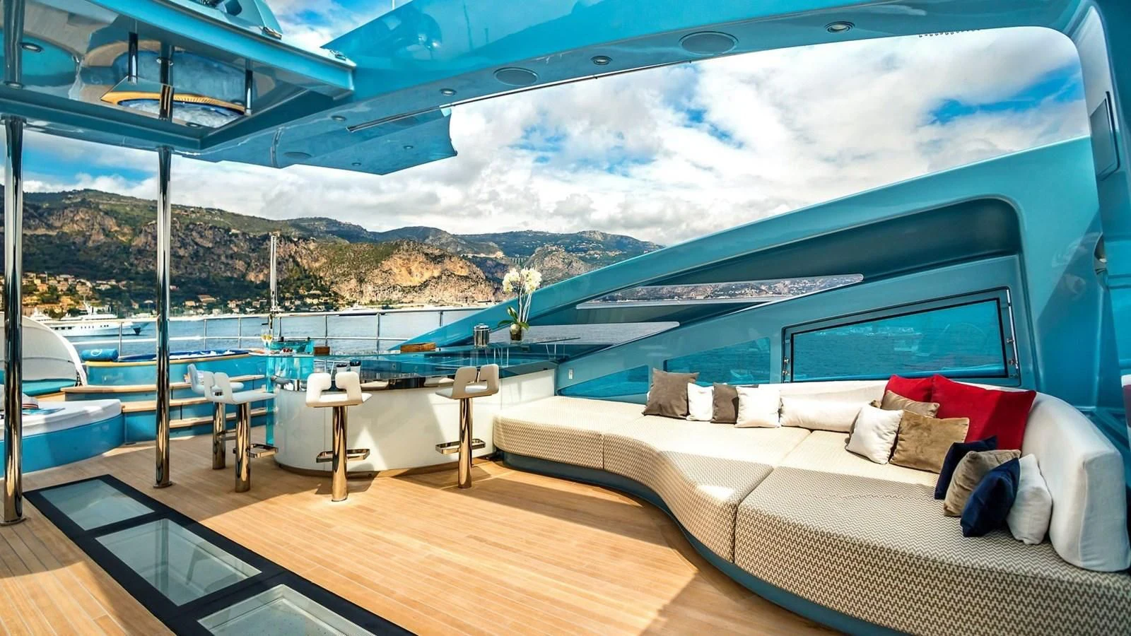 a large bed with a large blue and white wall aboard QUEEN ALLA Yacht for Sale