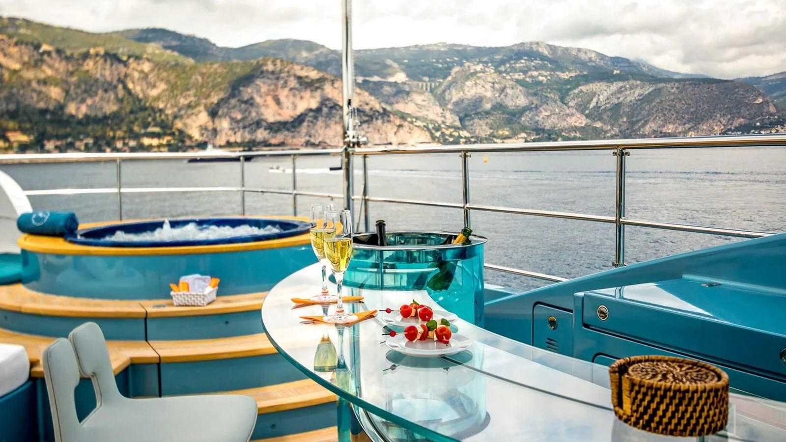 a couple of boats sit on a table on a boat aboard QUEEN ALLA Yacht for Sale
