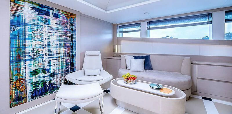 a room with a bed and a couch aboard QUEEN ALLA Yacht for Sale