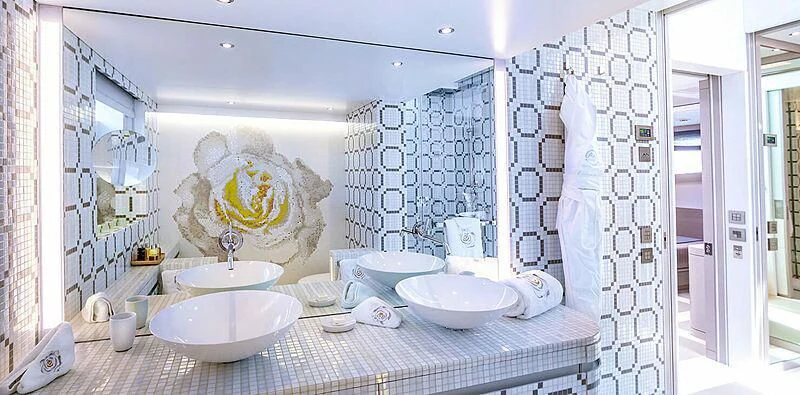 a bathroom with a large mirror aboard QUEEN ALLA Yacht for Sale