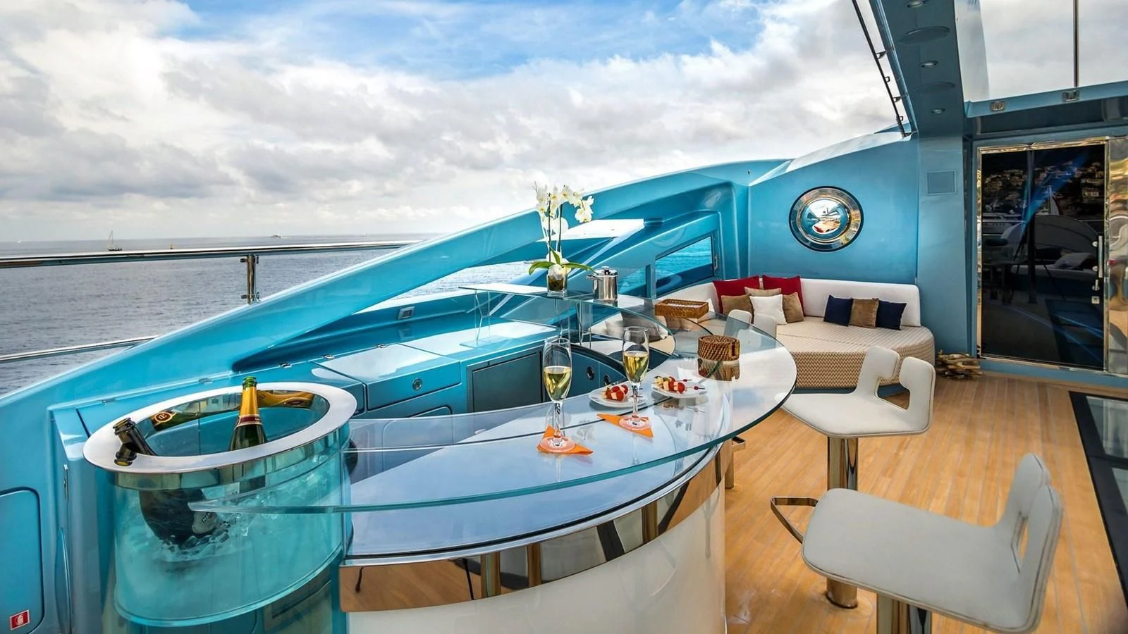 a large blue and white boat on a body of water aboard QUEEN ALLA Yacht for Sale