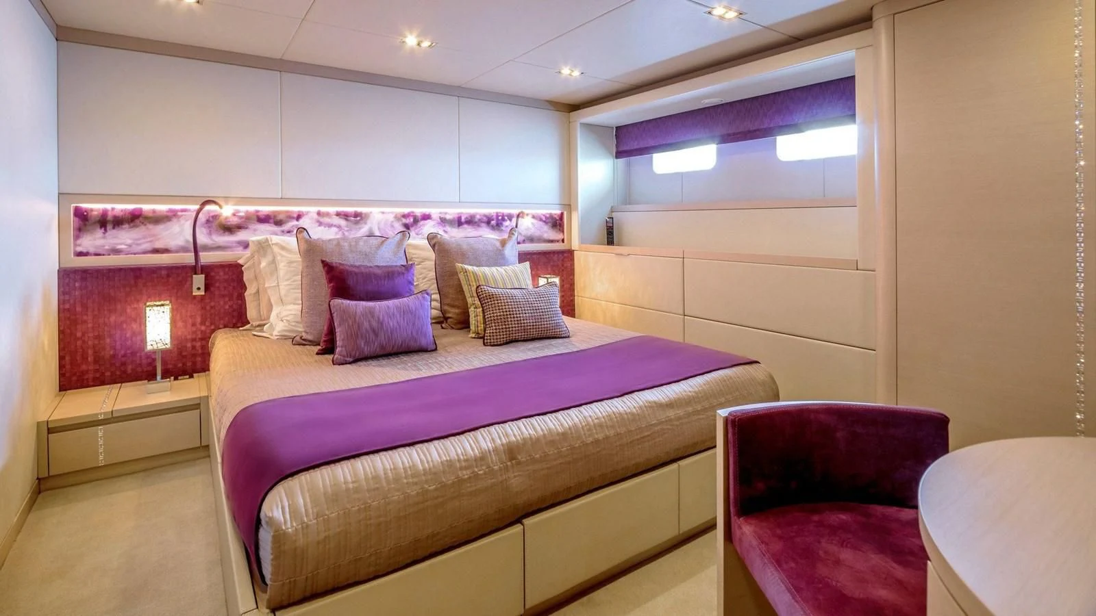 a bed in a room aboard QUEEN ALLA Yacht for Sale