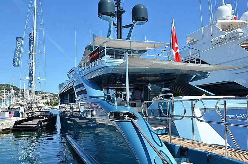 a large boat docked at a pier aboard QUEEN ALLA Yacht for Sale