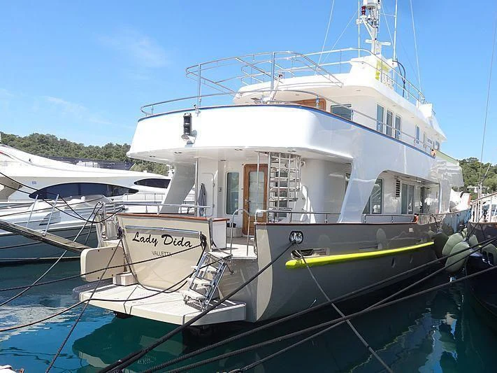 a boat docked at a pier aboard LADY DIDA Yacht for Sale