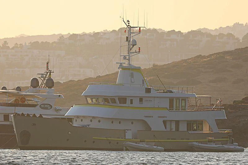 a large ship in the water aboard LADY DIDA Yacht for Sale