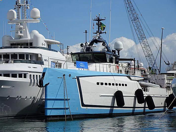 a few large white boats in the water aboard CHASING ROMANCE Yacht for Sale