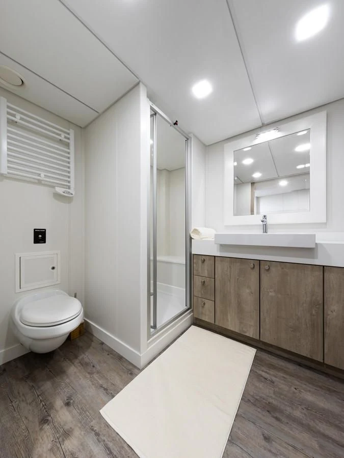 a bathroom with a sink and a toilet aboard CHASING ROMANCE Yacht for Sale