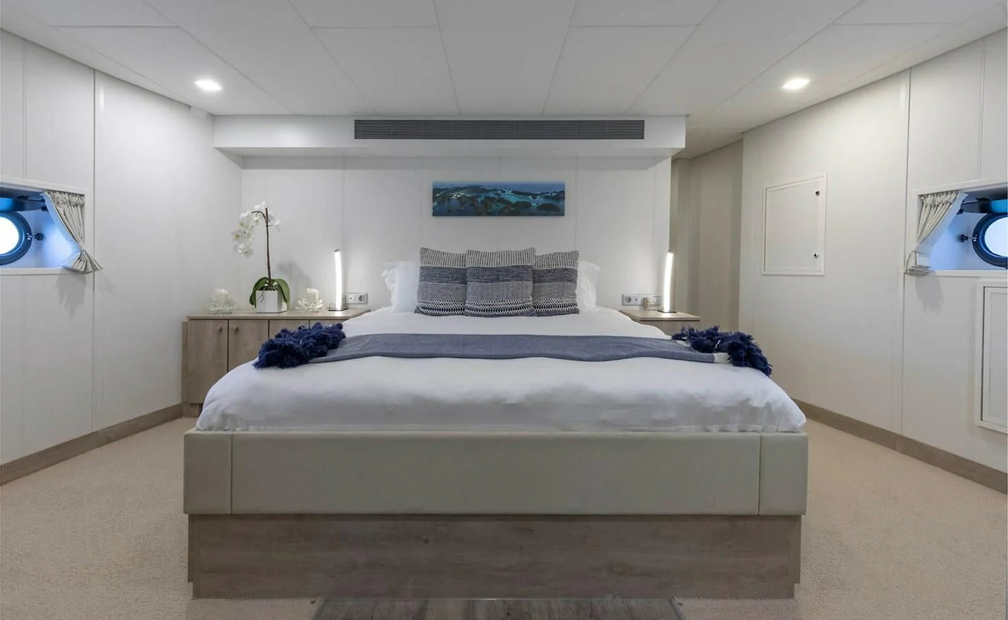 a bedroom with a bed aboard CHASING ROMANCE Yacht for Sale