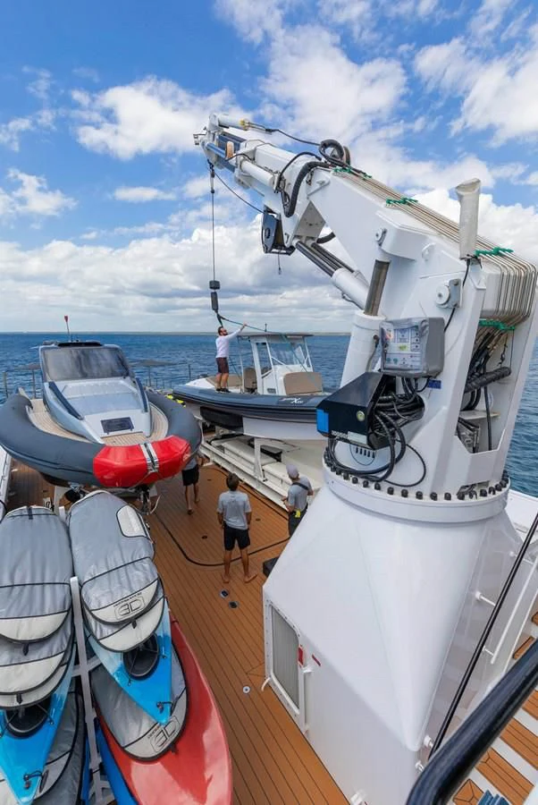 a group of boats are parked on a dock aboard CHASING ROMANCE Yacht for Sale