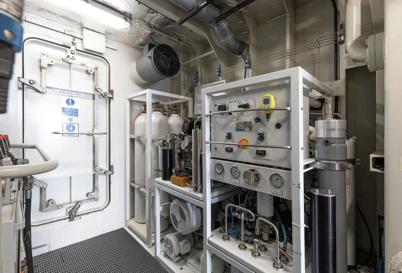 a machine in a room aboard CHASING ROMANCE Yacht for Sale