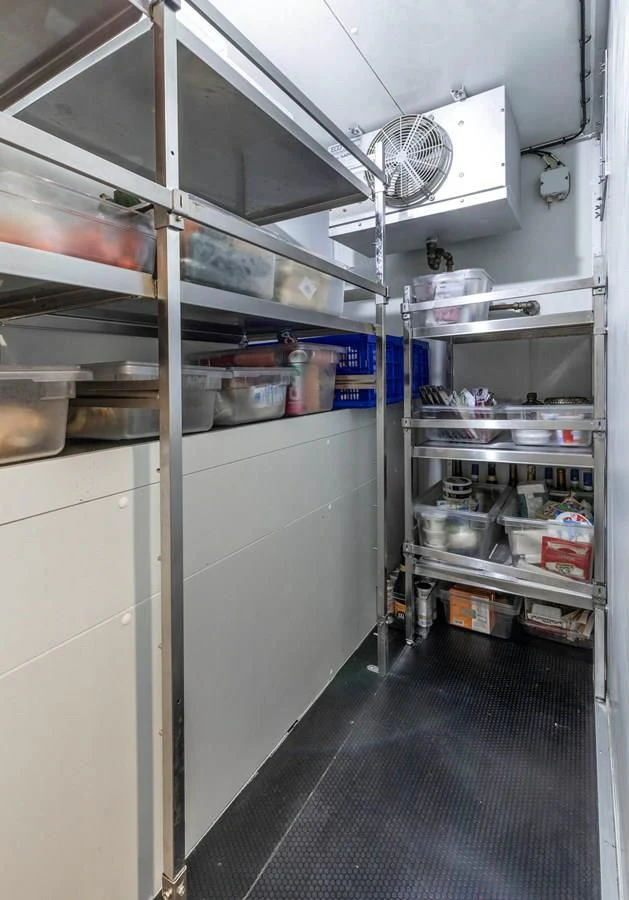 a large refrigerator with a fan aboard CHASING ROMANCE Yacht for Sale