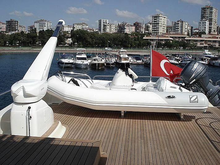 a boat docked at a pier aboard COSMOS LUNA Yacht for Sale