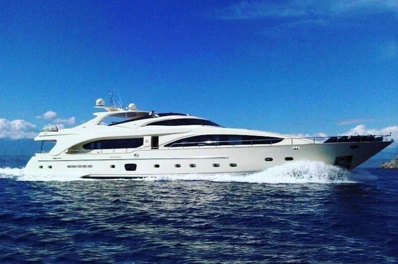 a white yacht on the water aboard COSMOS LUNA Yacht for Sale