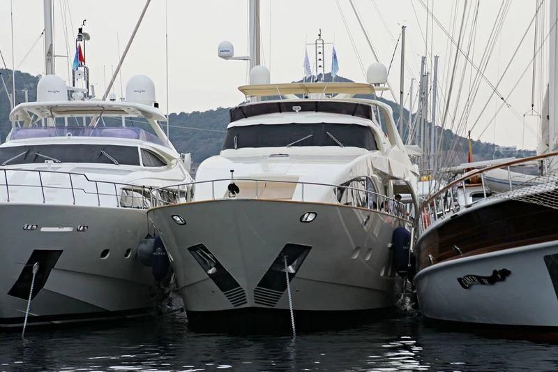 several boats in a harbor aboard COSMOS LUNA Yacht for Sale