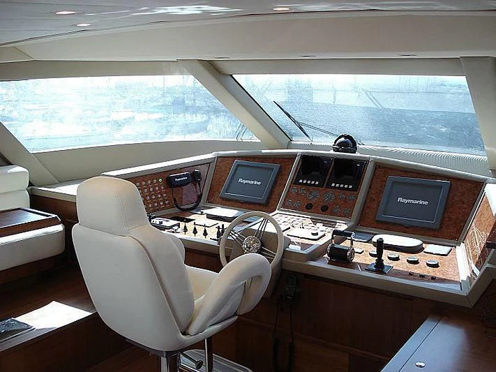 a room with many computers and monitors aboard COSMOS LUNA Yacht for Sale