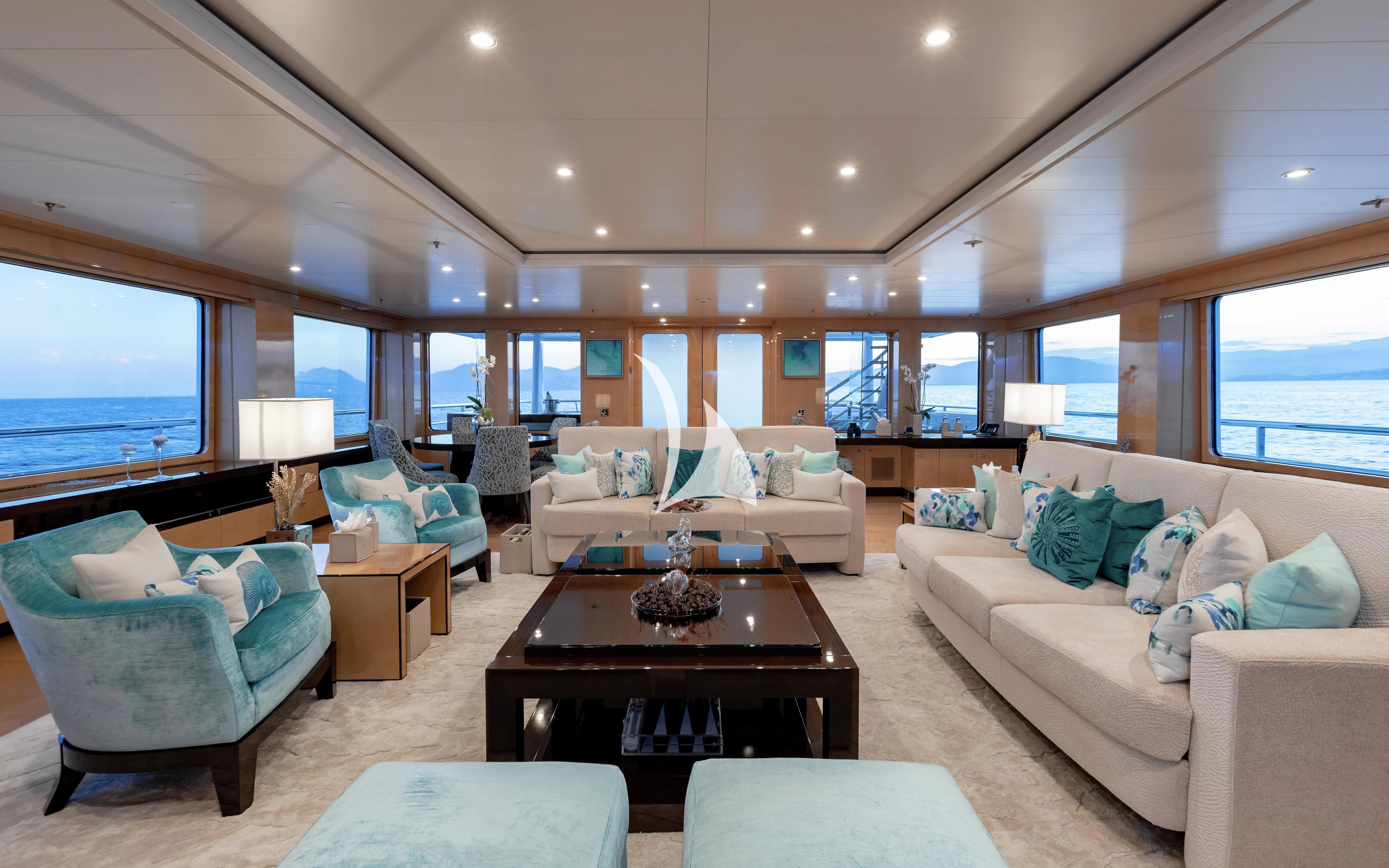 a living room with a large window aboard LA MIRAGE Yacht for Sale
