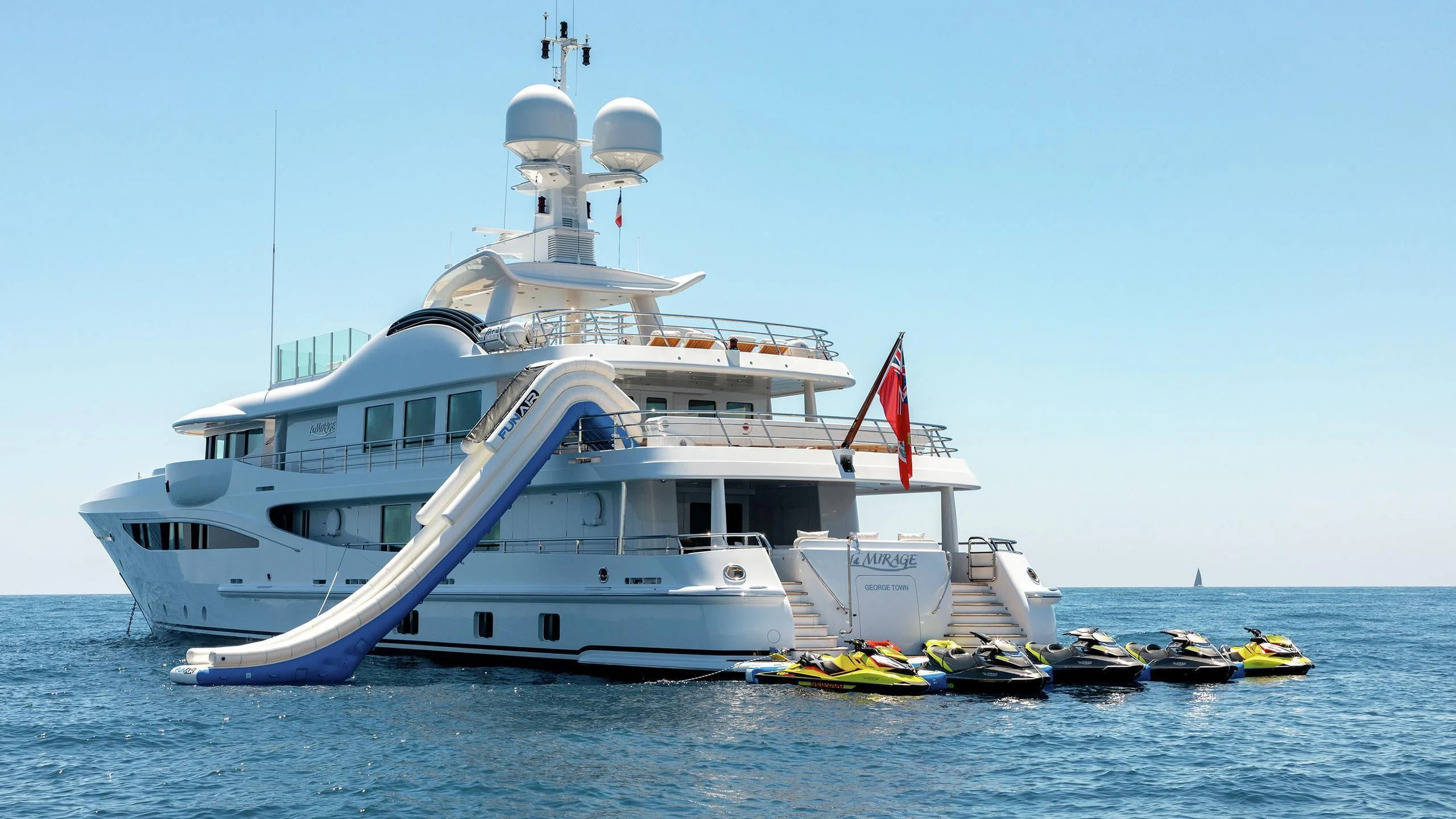 a large white boat in the water aboard LA MIRAGE Yacht for Sale
