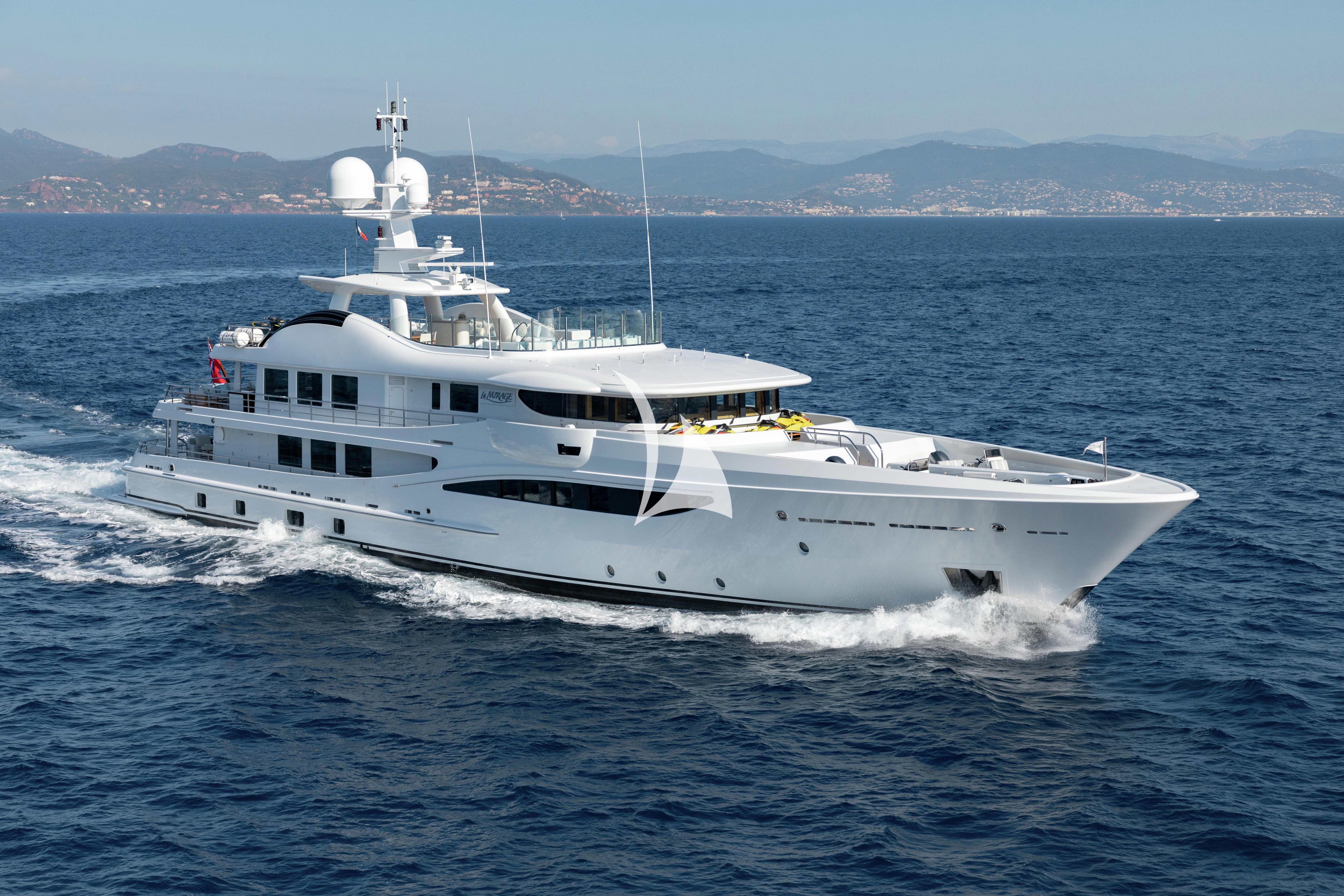 a white yacht on the water aboard LA MIRAGE Yacht for Sale