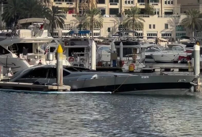 a boat docked at a pier aboard SPIRIT OF ZEN Yacht for Sale