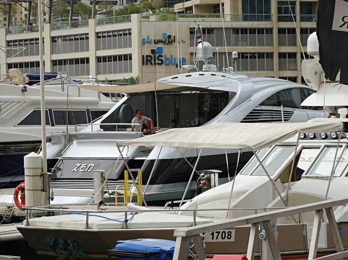 a boat is parked in a harbor aboard SPIRIT OF ZEN Yacht for Sale