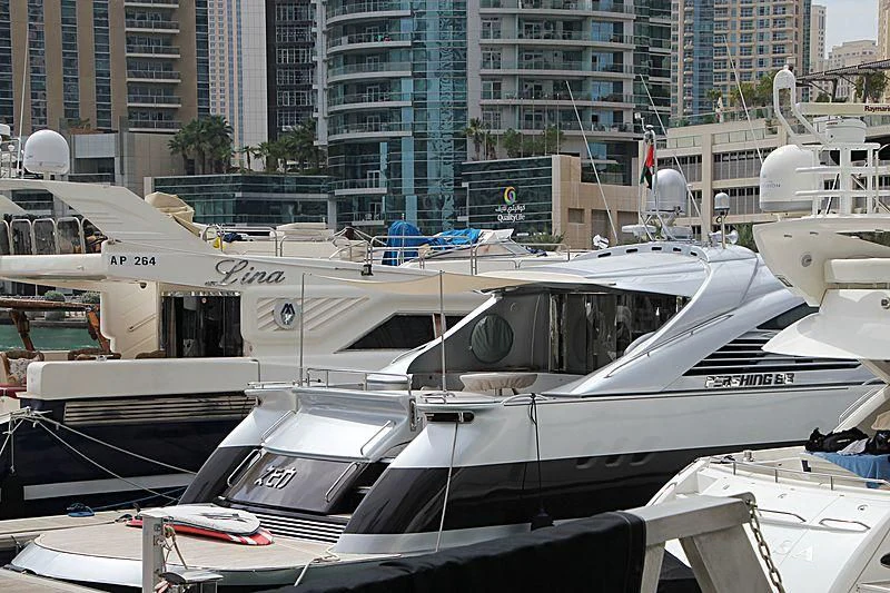 a group of boats are parked in a harbor aboard SPIRIT OF ZEN Yacht for Sale