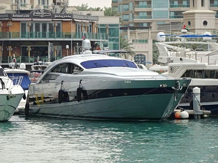 a boat docked at a pier aboard SPIRIT OF ZEN Yacht for Sale