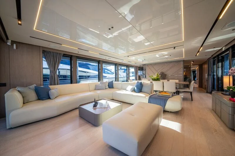 a living room with a large window aboard IKAL Yacht for Sale