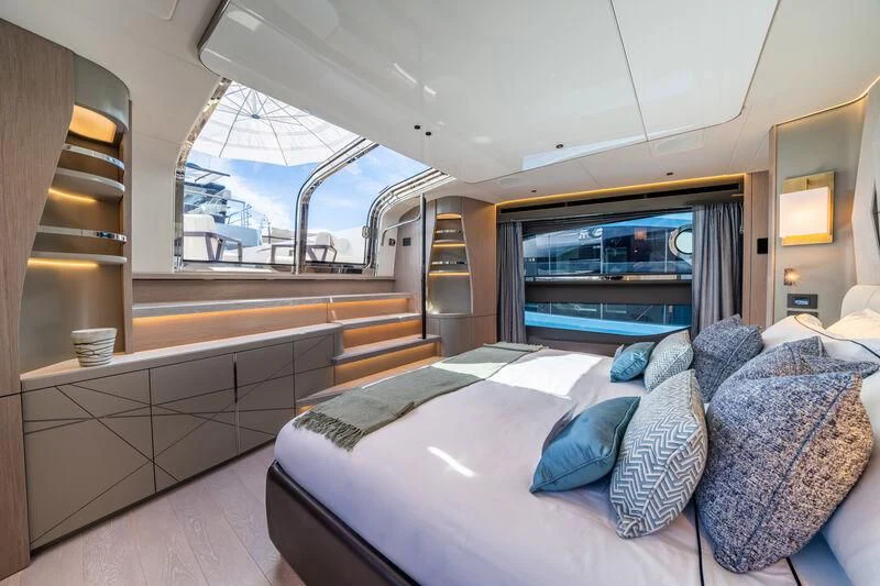 a room with a couch and a window aboard IKAL Yacht for Sale