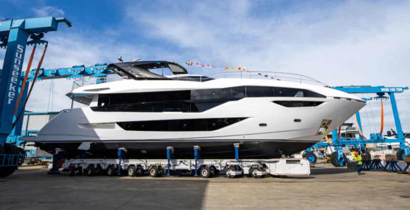 a large white boat aboard IKAL Yacht for Sale