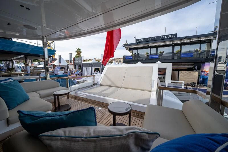 a large room with a couch and a table aboard IKAL Yacht for Sale