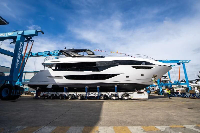 a large white airplane aboard IKAL Yacht for Sale