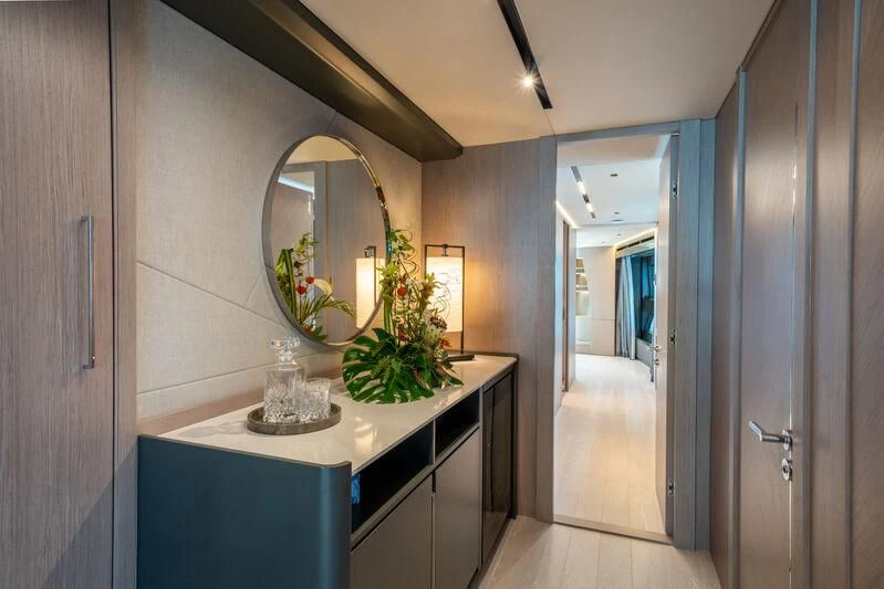 a bathroom with a large mirror aboard IKAL Yacht for Sale