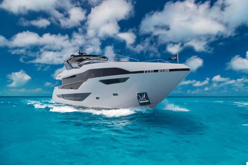 a white yacht in the ocean aboard IKAL Yacht for Sale