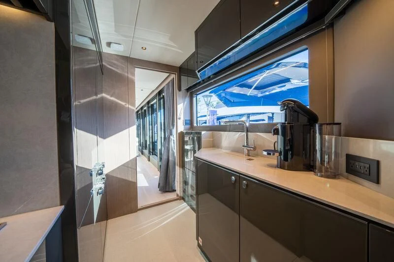 a kitchen with a large counter aboard IKAL Yacht for Sale