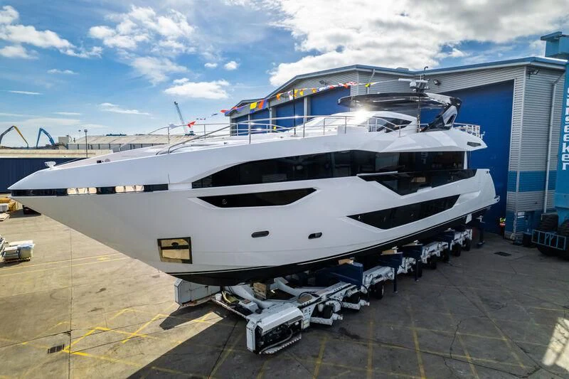 a large white boat aboard IKAL Yacht for Sale