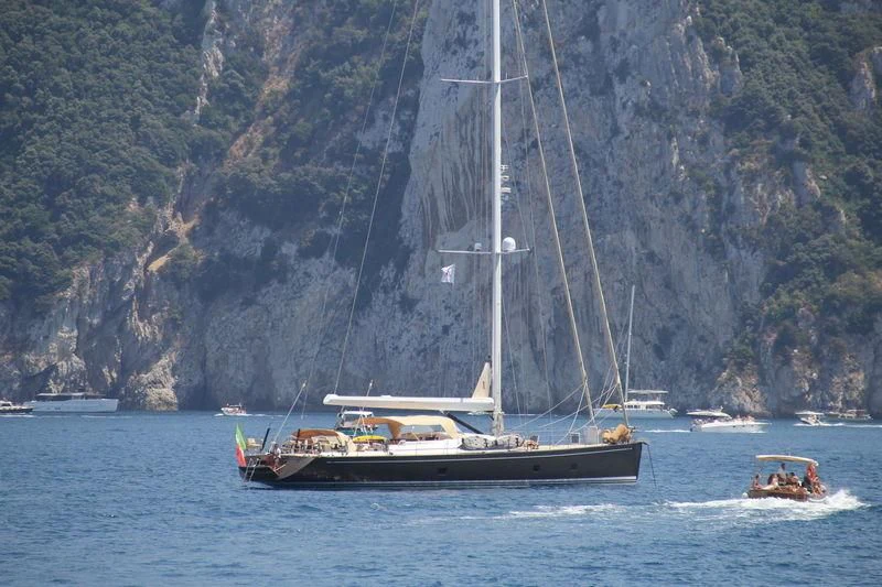 a boat sailing on the water aboard FAR AND WIDE Yacht for Sale