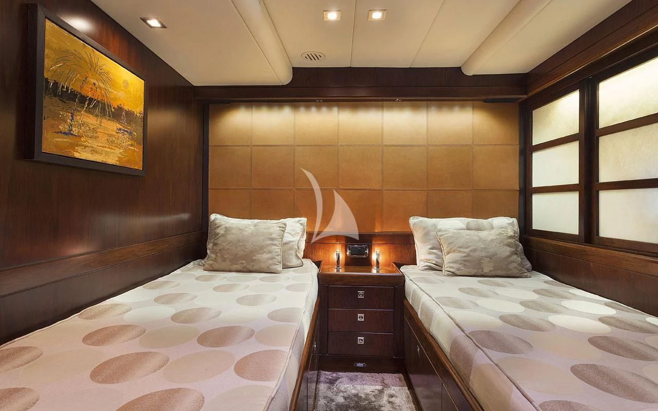 a couple of beds in a room aboard FAR AND WIDE Yacht for Sale